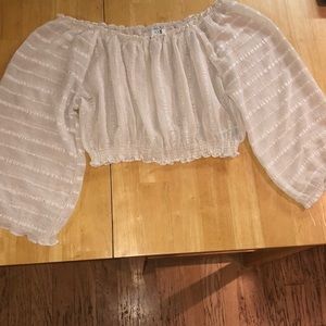 cream colored blouse crop top